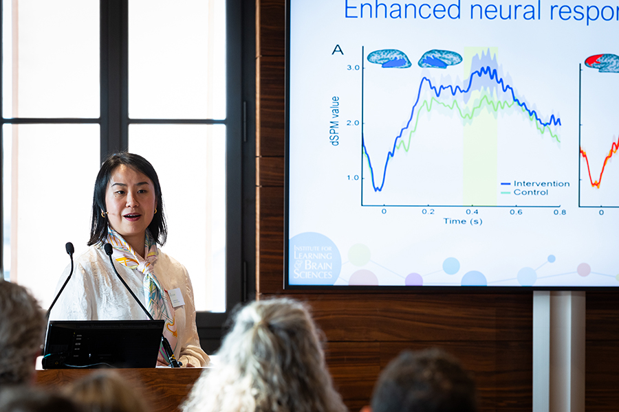 Dr. Zhao presenting research.